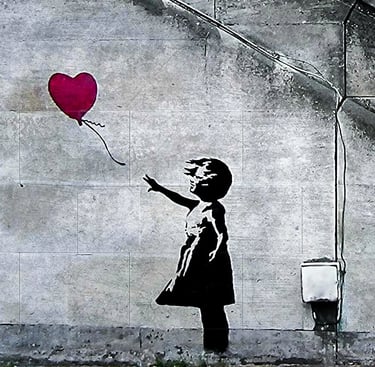Banksy a girl with a red balloon in the air