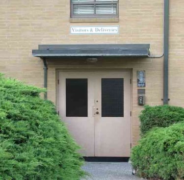 Visitors' and deliveries' entrance.
