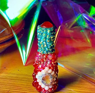 Mini Tabasco bottle covered in rhinestones