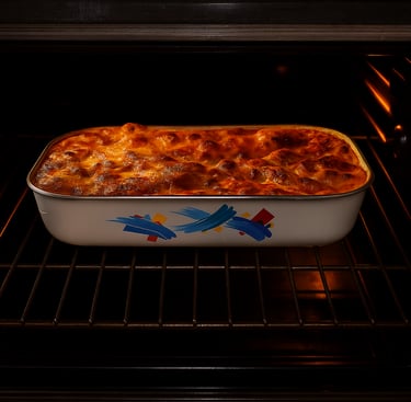 Golden brown cheesy lasagna baking in a ceramic casserole dish inside a kitchen oven.