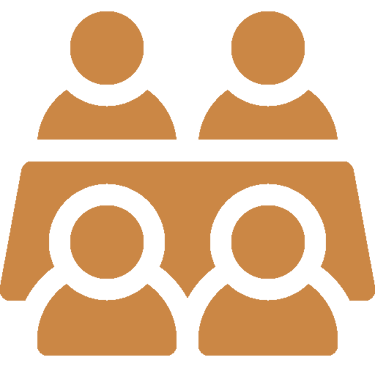 Brown flat icon of four people sitting around a table for a business meeting or team collaboration.