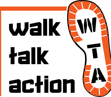 a pair of shoes with the words walk talk action