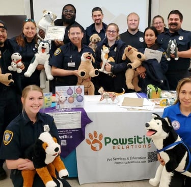 Animal control offices learning about Pet CPR