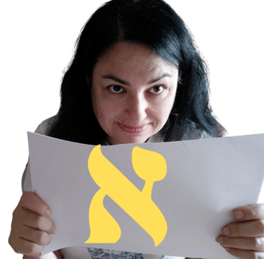 a woman holding a paper with a yellow x on it