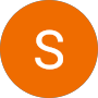 A minimalist circular orange icon featuring a white capital letter S in the center.