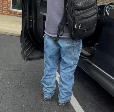 Car lockout service in Asheville NC with locksmith opening car door