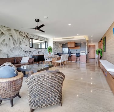 Professional photography of a spacious, open living room in a Los Cabos luxury condo.