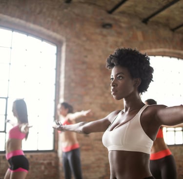 a woman and man exercising for improved energy and advanced focus