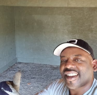 a man in a baseball cap and a glove