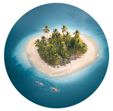 People swimming around a paradise island