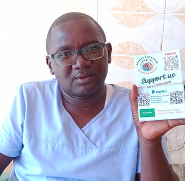 Dr. Vet Peter from Animal Aid Kenya with AAK flyers