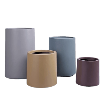a set of three vases with different colors and shapes