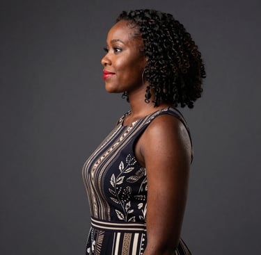 Portrait of a smiling professional woman in a modern office setting.