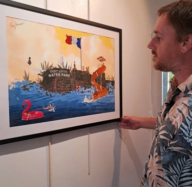 Artist closely examining a framed digital illustration of a water park scene "Splashback"