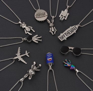 a circle of silverware with a bottle of soda