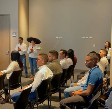 a man standing in front of a room full of people