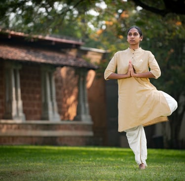 a women hold variksh asna or tree posture