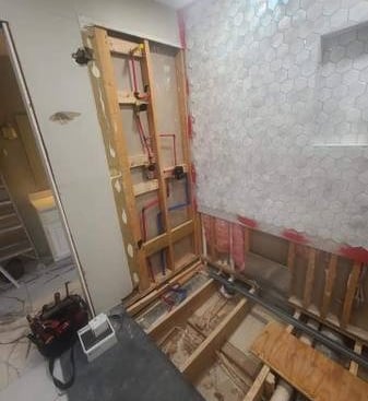framing for shower and tub during a bathroom remodeling project