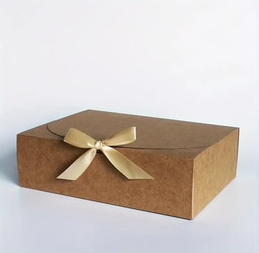 gift box with beige, brown and gold cardboard bow