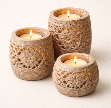 Hand-carved stone candle holders with floral cutwork design