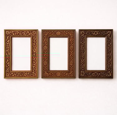 Carved wooden photo frames with traditional designs