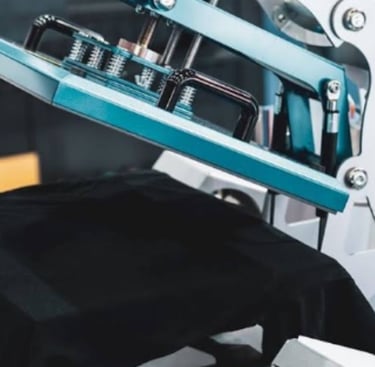 A commercial heat press pressing a t-shirt