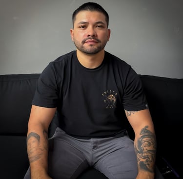 Junior, tattoo artist at Royal Nine Tattoo in Dallas, TX, focused on a custom cover-up tat