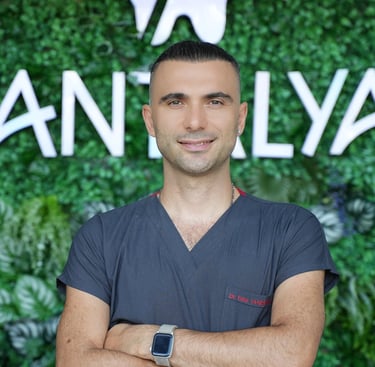 a man in a gray shirt and a watch on his wrist