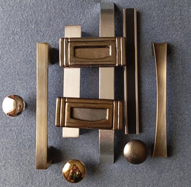 a bunch of different types of cabinet and drawer handles and knobs