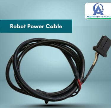 A coiled black robot power cable with a connector from ARM Technologies KSA.