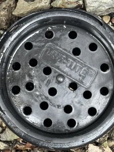 closeup image of a clean drain cover