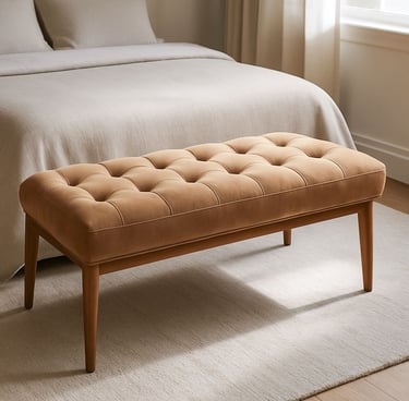 ufted velvet bedroom bench at the foot of a bed with soft light and textured surroundings in a modern space.