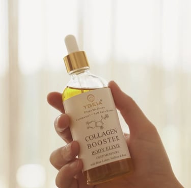 Hand holding a bottle of Ygeia Collagen Booster Body Elixir with a glass dropper in soft natural light.