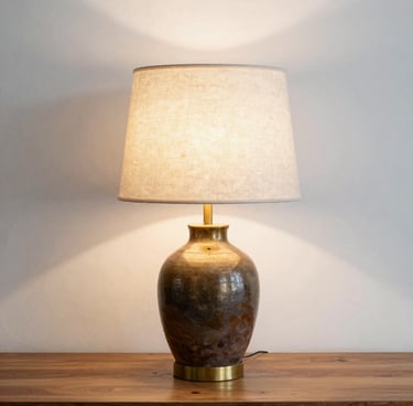 A moody walnut-toned living room bathed in warm amber light, showcasing a serene and inviting atmosphere.