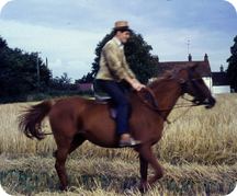 Aged about 19, exercising his sister's hunter  before mounting his Dad's combine harvester.