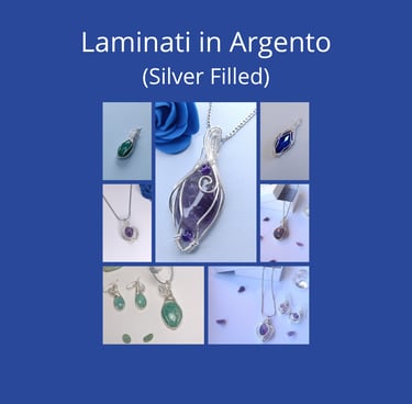 Handmade silver filled wire wrapped jewelry including natural gemstone pendants and earrings.