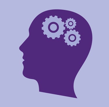 Silueta de una cabeza con tres engranajes