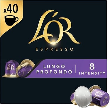 a coffee cup of coffee with a gold foil cap