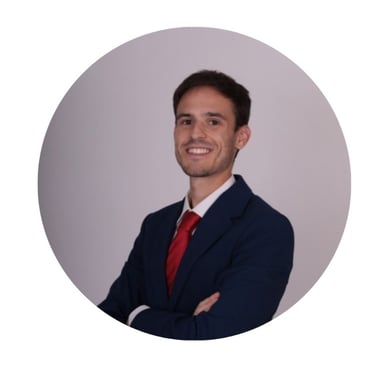 a man in a suit and tie smiling