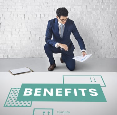 A man is sitting on a knee with a document in hand reading the documents data to check benefits and losses.
