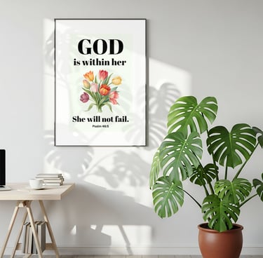 Framed Bible verse wall art with Psalm 46:5 quote and colorful tulip bouquet next to a monstera plant.