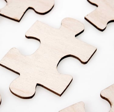 Image of wooden jigsaw puzzle piece