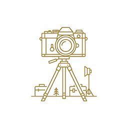 gold line art icon of a camera