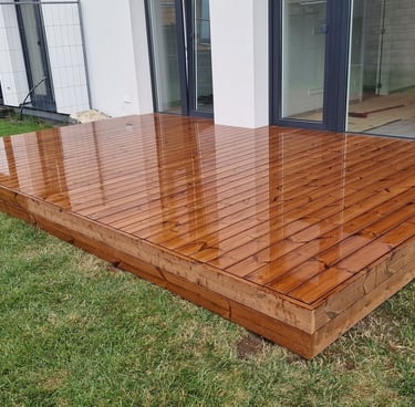 a wooden deck with a wooden decking area