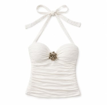 Chic white halter top flatlay with soft neutral aesthetic