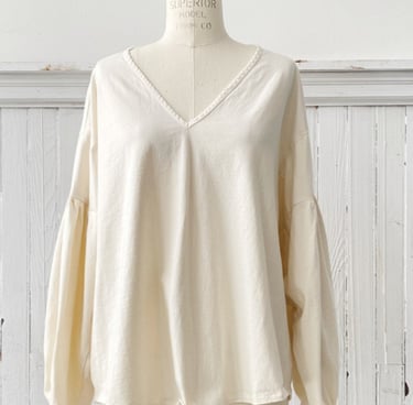 white blouse on a mannequin