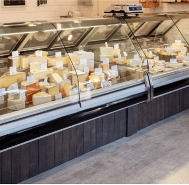 imported cheeses, display case