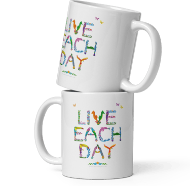 Ceramic mugs with the words Live Each Day printed on both sides in tropical exotic wordart