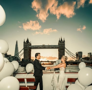 a bride and groom holding hands in front of Tower Bridge