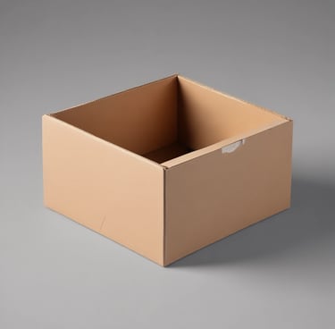 A bus station with signs indicating services such as taxi, tickets, restroom, and ATM. People are sitting on benches, with some holding luggage. A bright orange bus is parked nearby. The station is partially shaded, with sunlight creating patterns on the ground.